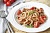 Морепродукты в томатном соусе со спагетти и томатами черри